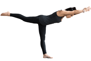 Woman in Warrior III yoga pose asana